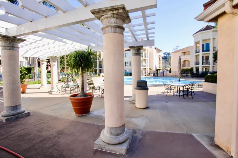 An outdoor pool area in a community in River Scene Mission VAlley CA.