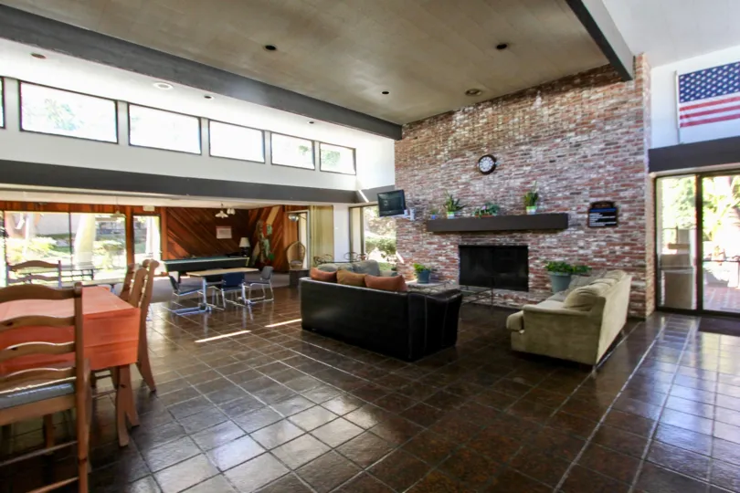 Living room with brick ire place at The Bluffs in Mission Valley California