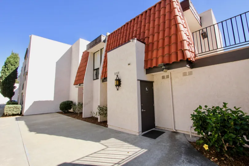 A red tiled roof sits vertically on a condo at The Franciscan