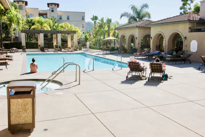 The swimming pool and hot tub at the Missions at Rio Vista apartment complex.