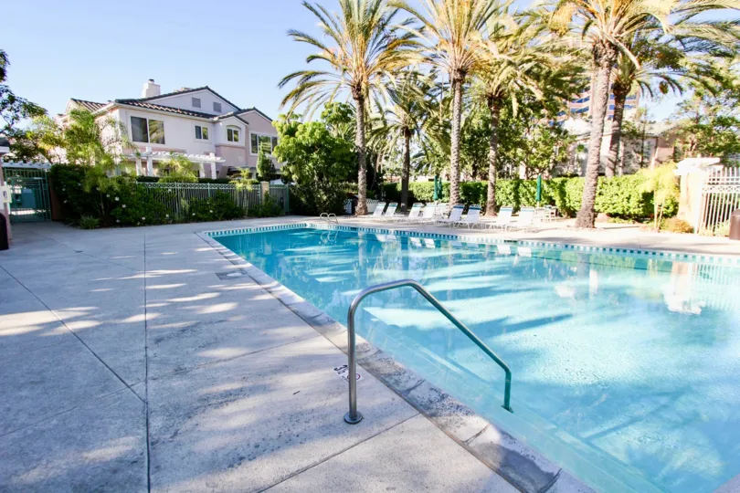 The premises of a house in Unique Square community with elegant pool and garden