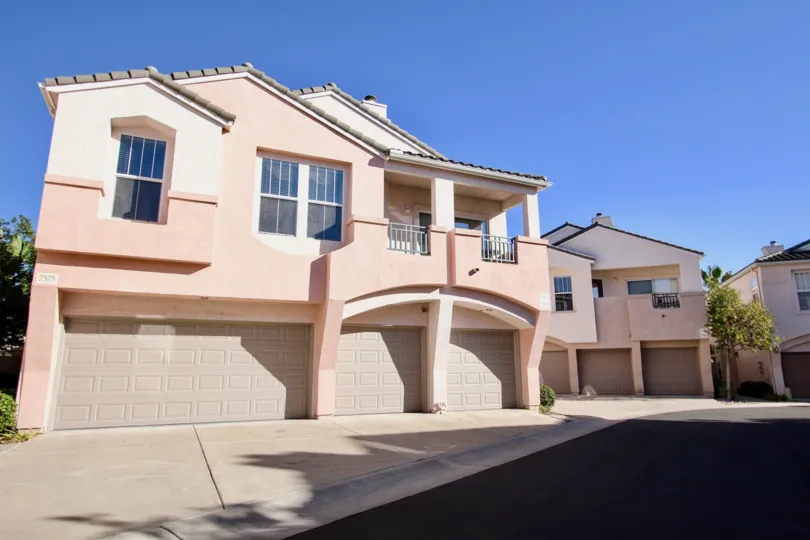Two story pink town homes with three garages inside Union Square at Mission valley CA