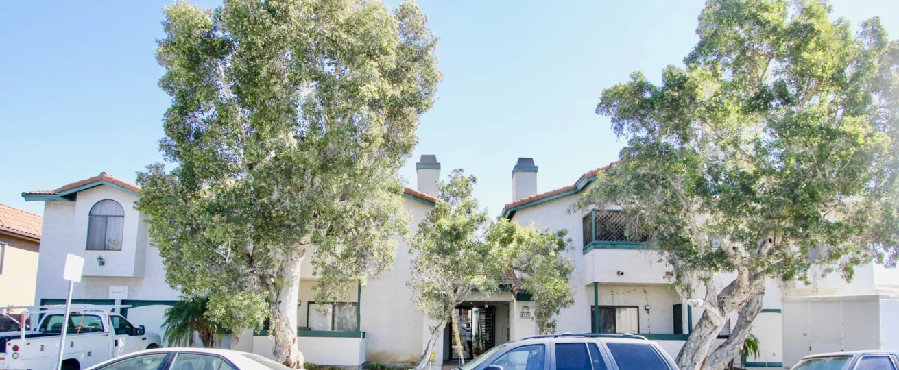 Front of the building with trees on 34th Street Villas.