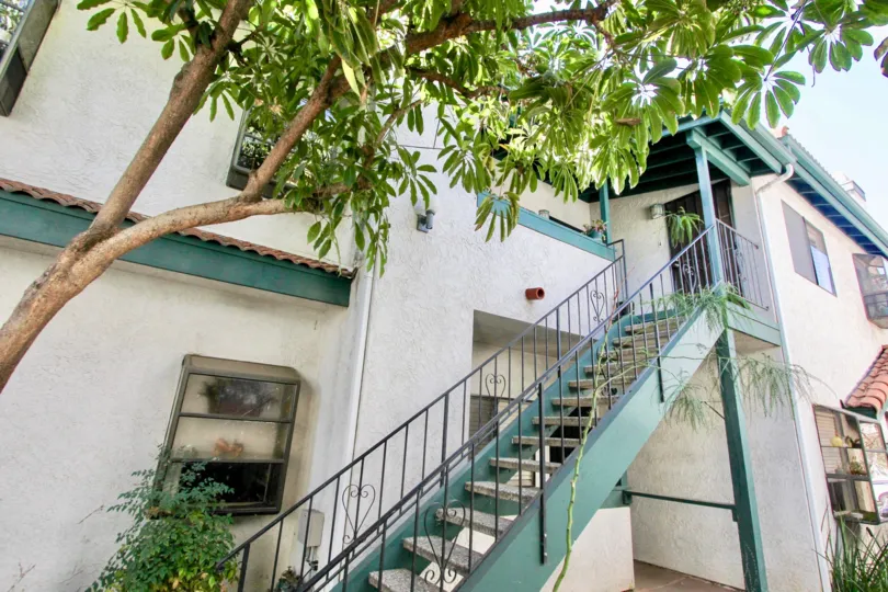 The green staircase leading upto apartments in 34th Street Villas in California.