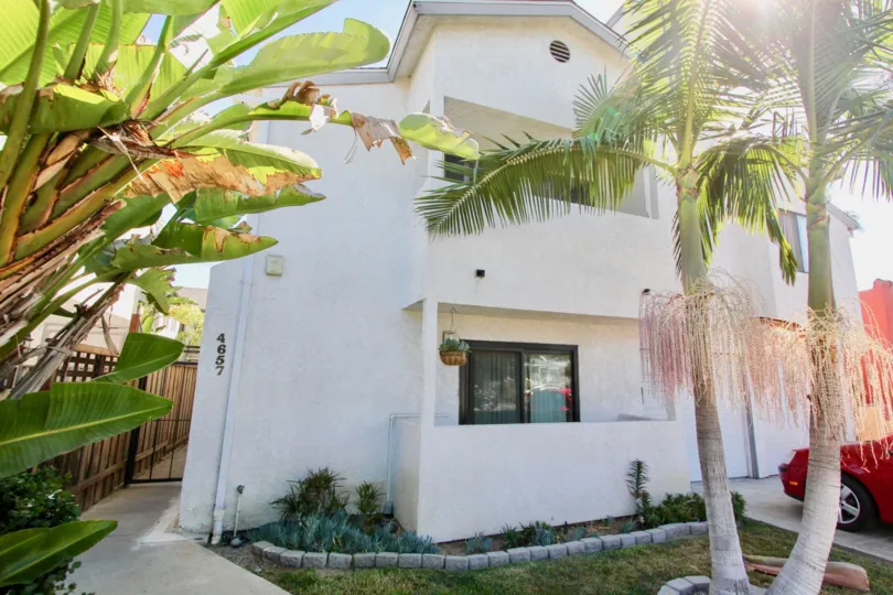 Marvellous House with Banana tree plantation in front of the house with car parking on sunshine day in A2I Condominiums of Normal Heights city