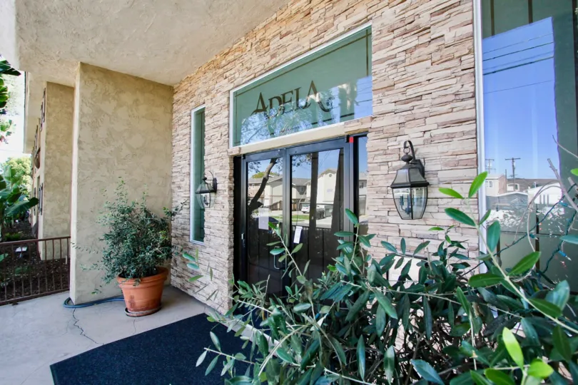Office complex with potted plants in Normal Heights, CA on a sunny day