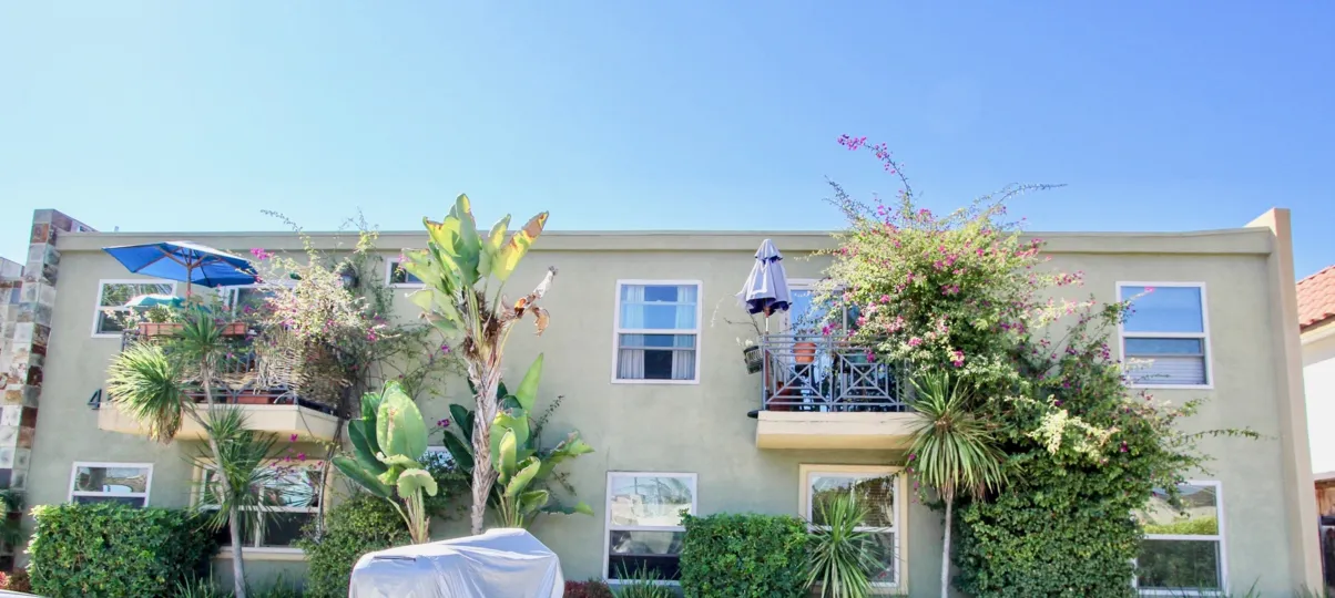 A sunny day in the area of Alante, outside, tropical, palm trees, balcony, umbrella