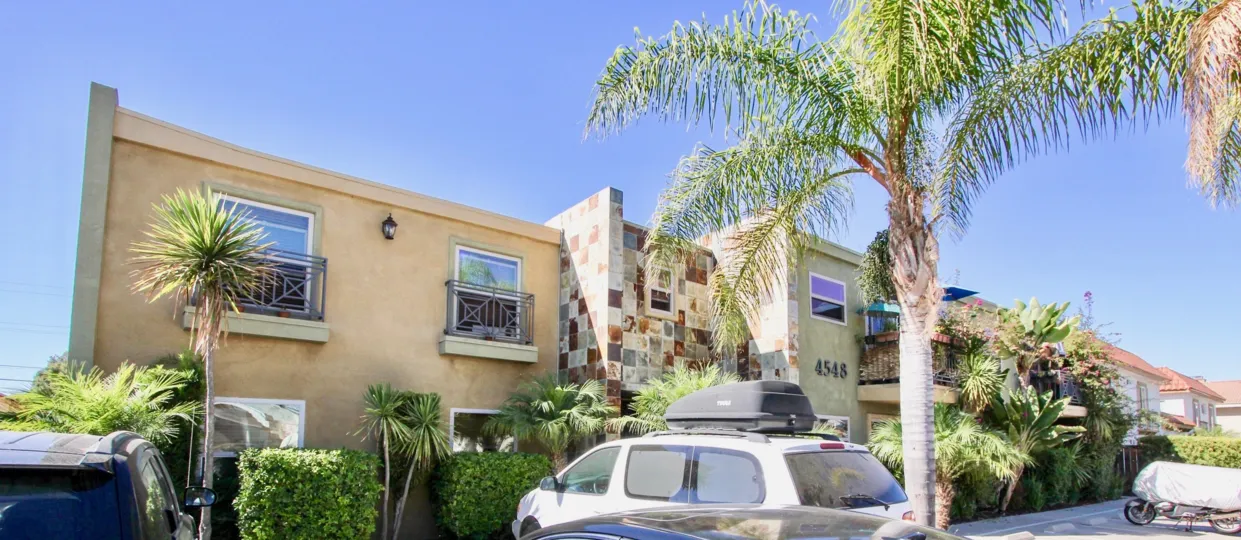 Palm trees and outdoor parking at Alante in Normal Heights, CA
