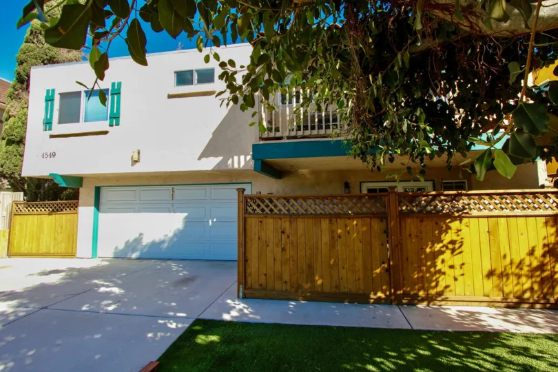 Driveway and garage entrance of apartment at Bancroft Normal Heights in Normal Heights, Ca.