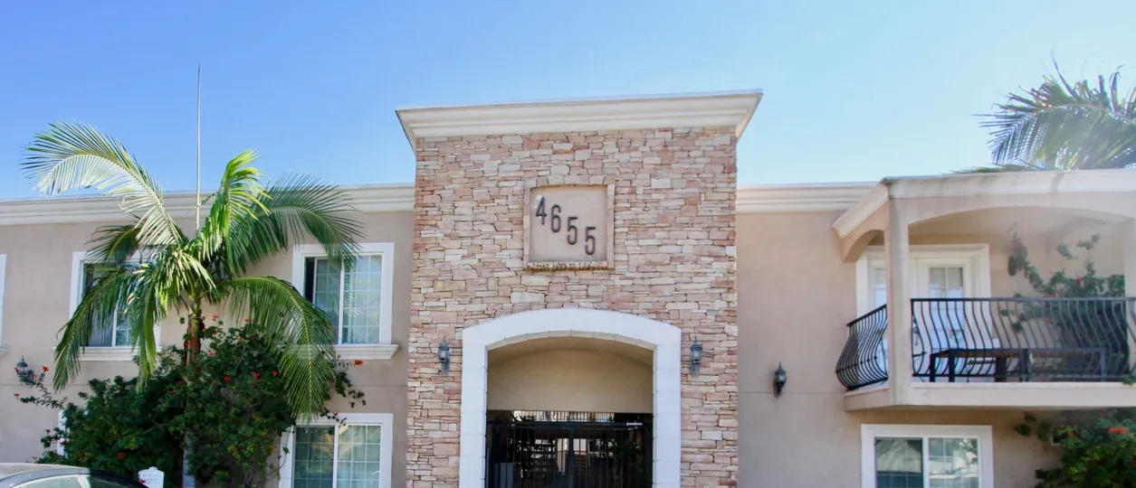 A stone wall over an entrance at Casa Bonita in Normal Heights CA