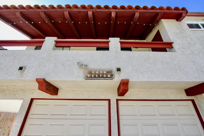 A sunny day in the area of casa Felton, awning, patio, balcony, garages, lights condo