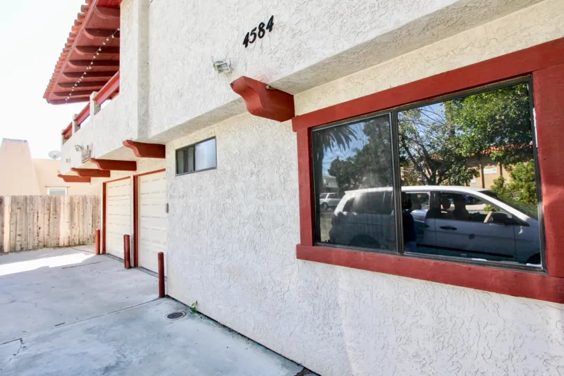 Stucco bulding, home, building, residence, privacy fence,