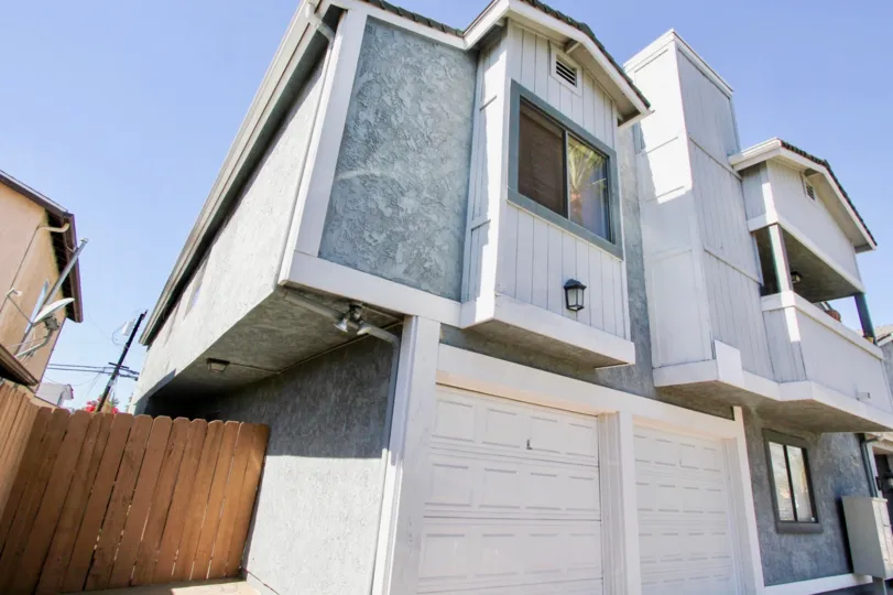 Cherokee Court white building with 2 garage in Normal Heights California