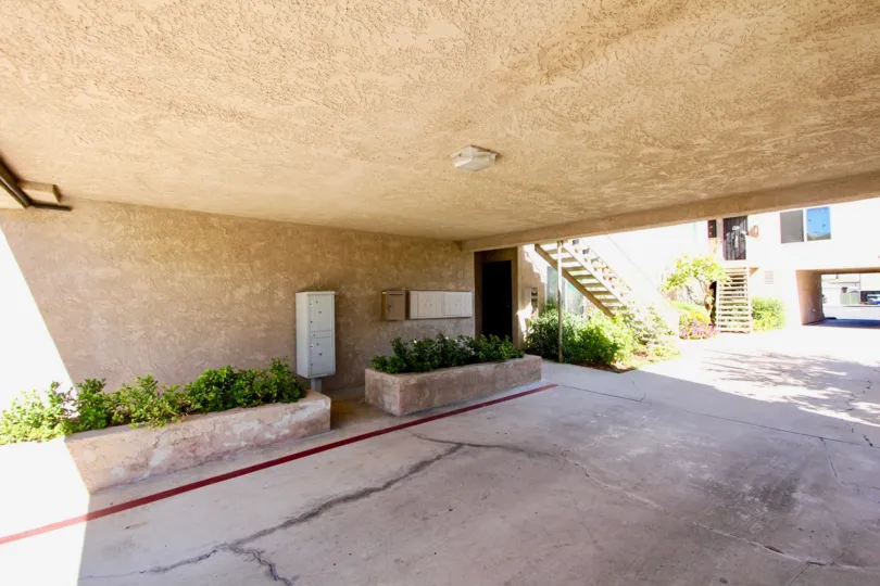 view from the path leading to inside a housing community in Cityscape, normal heights CA, its decent and welcoming with little bushes