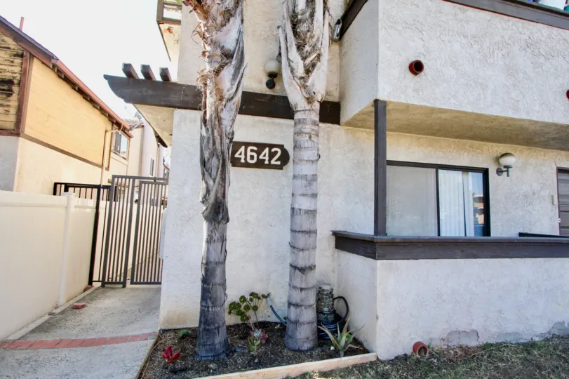 Entrance to one apartment with metal gate at Felton Manor in Normal Heights, Ca.