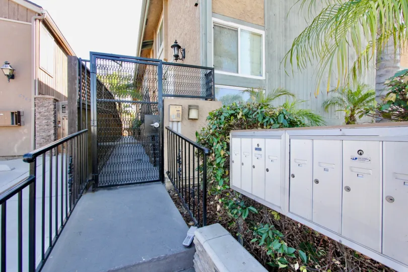 A beautiful fence and garden in the backyard of Felton Place