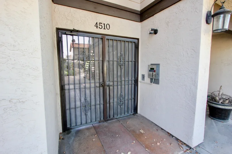 A security door locks the entrance of the Garden Heights community in Normal Heights, California.