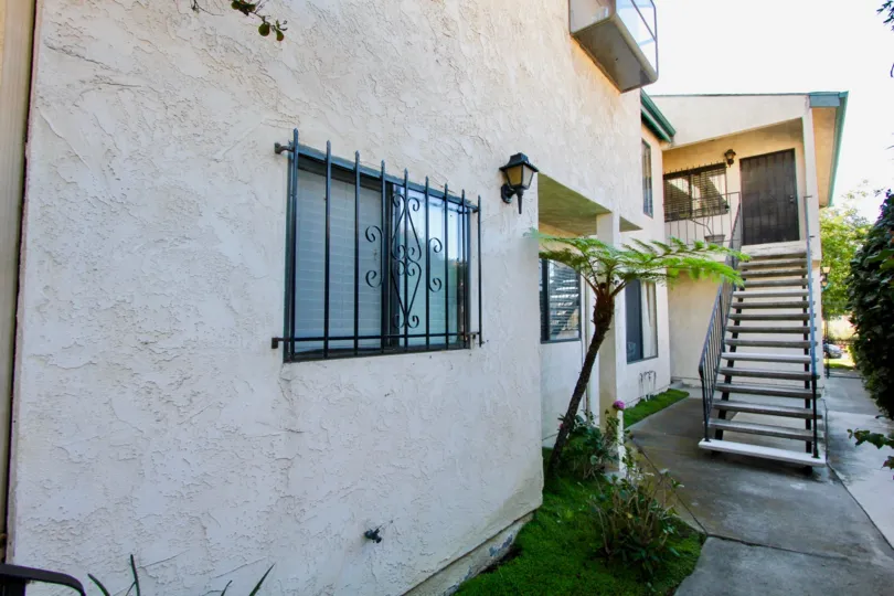 A two-storey residence in the Hamilton Street Condos community with an exterior staircase.