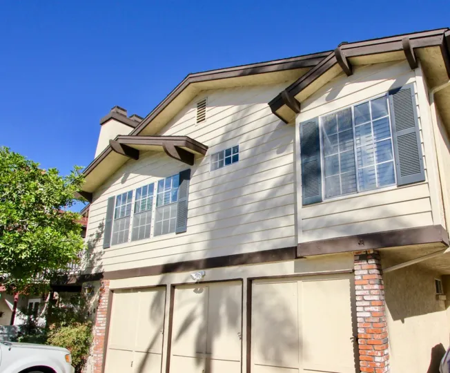 House located in Hermitage II in Normal Heights, California. Has windows, a garage, and driveway.