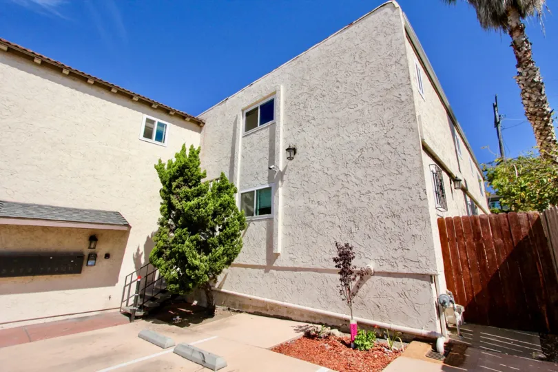 Sunny day bluesky side view of Hilltop Condominiums, Normal Heights, CA