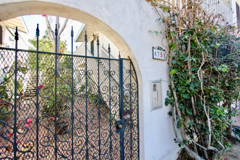 The Main Gate in the house with good greenary with flowers with house number in Mission Villas II of Normal Heights.