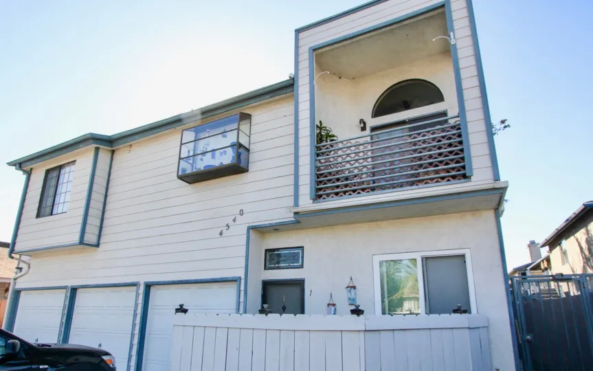 The back of a house in North Court, with an enclosed balcony.