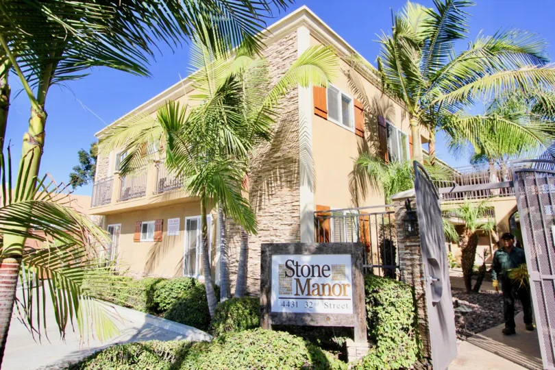 Surrounding palm trees outside of Stone Manor in Normal Heights