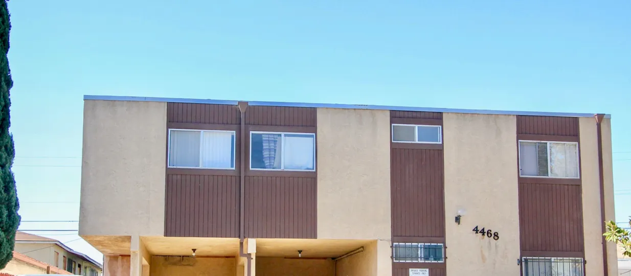 A sunny day in the area of Teralta Heights, Outside, parking area, condos, high rise, window, tree
