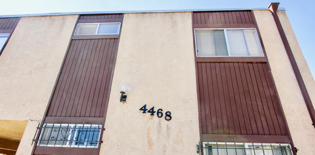 A sunny day in the area of Teralta Heights, windows, house number, light, bars, roof