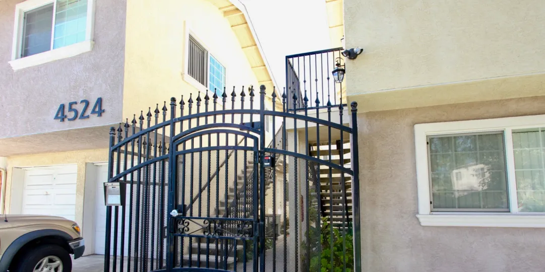 Gated apartment buildings at The Bentley in Normal Heights, California