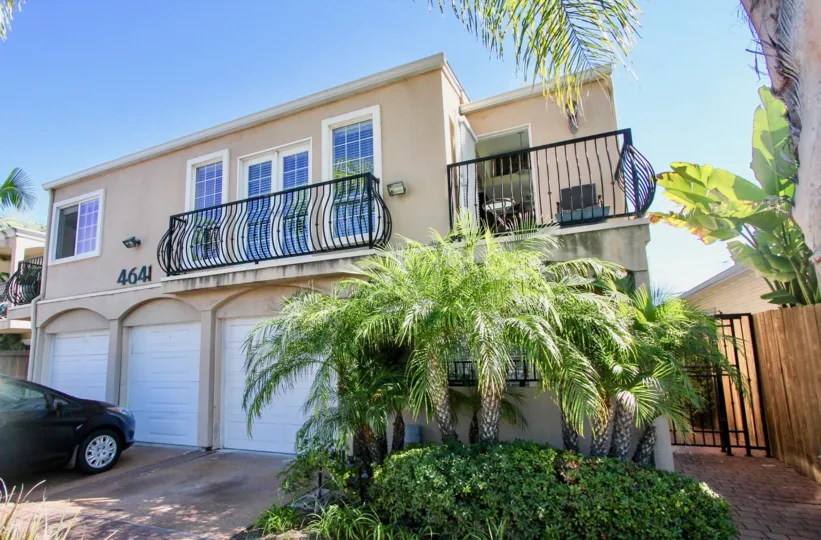A simple three-storey residence in Villa Bonita community with a terrace and three-car garage.