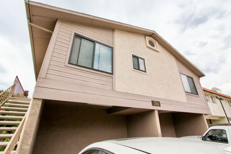 A sunny day in the area of 3766 31st Street, condos, stairs, card, parking area