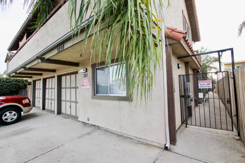 Secure entrance, including security cameras on the two story garage community of 3814 35th St in North Park, CA
