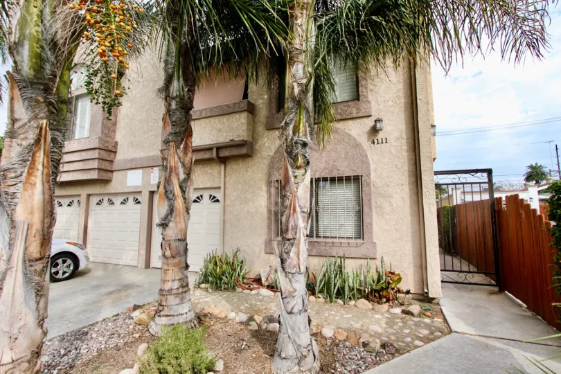 Multiple story housing with garages at 4111 Iowa St in North Park California