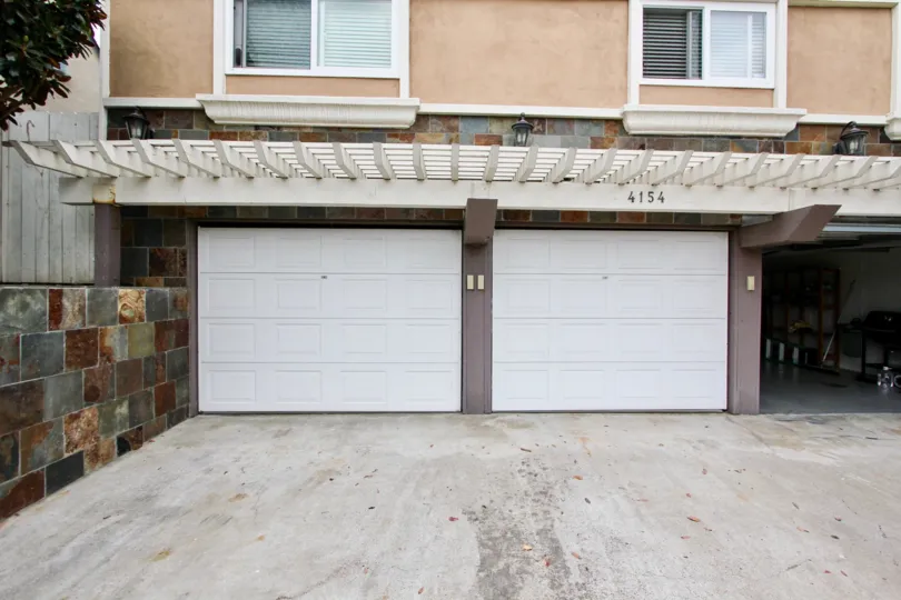 Housing with attached garages and driveway at 4154 Louisiana St in North Park California