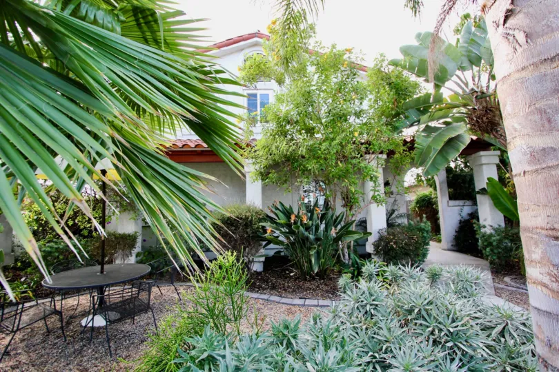 Front of a house with beautiful front yard and patio in the 4166 Wilson Ave