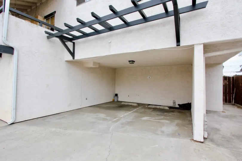 A sunny day in the area of 4185 Louisiana Street, condo, gated door, parking lot