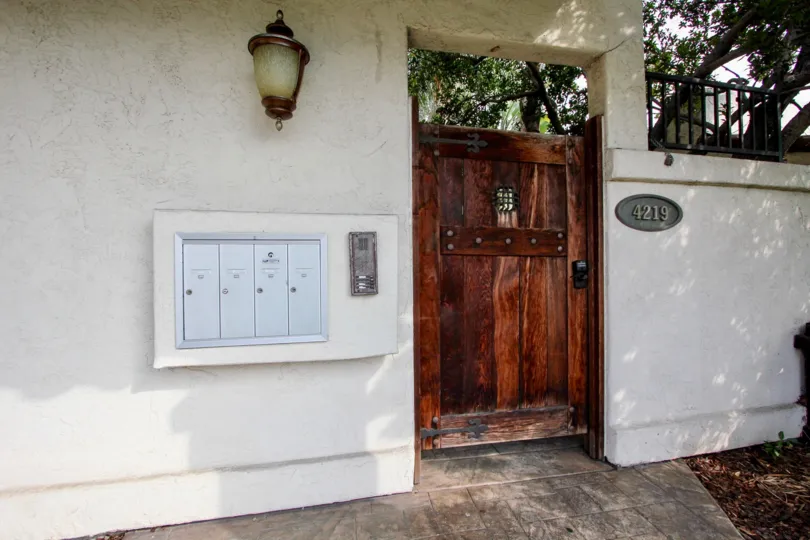 A sunny day in the area of 4219 Felton Street, mailboxes, wooden door, light