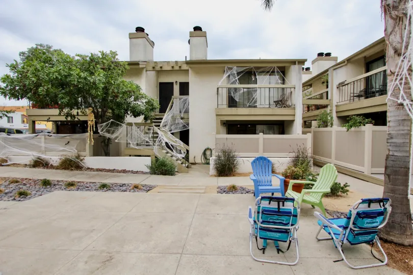 This low rise apartment complex is located in Alabama 12 community, in North Park, California. There seems to be four units per building, and each unit has a balcony or outdoor terrace if on the ground floor. There is a shared common space with seating an
