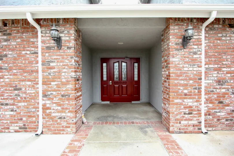 The entrance doorway to a brick building in Arizona Gardens