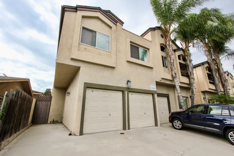Two story residential building with attached garages at Bancroft Street in North Park California