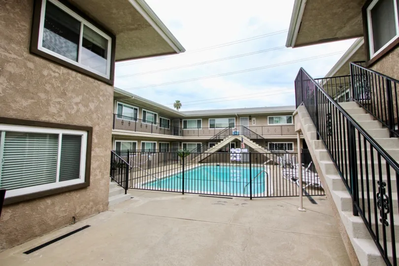 Swimming pool surrounded by residential buildings at Beacon Point in North Park California