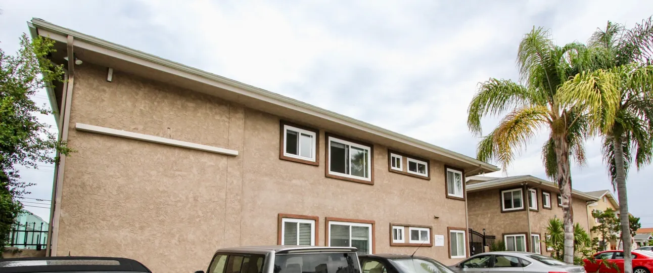 Beacon Point Apartment in North Park with its parking lot full on a typical day, Beacon Point, North Park, California