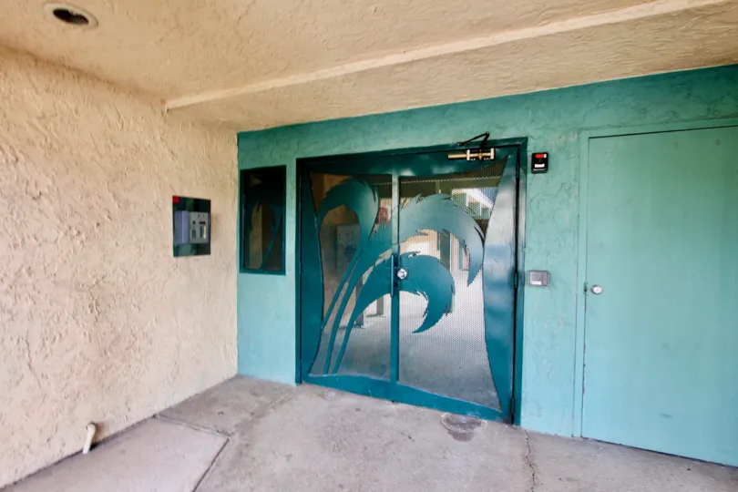 A sunny day in the area of Bramson Place, sliding doors, entrance, cement