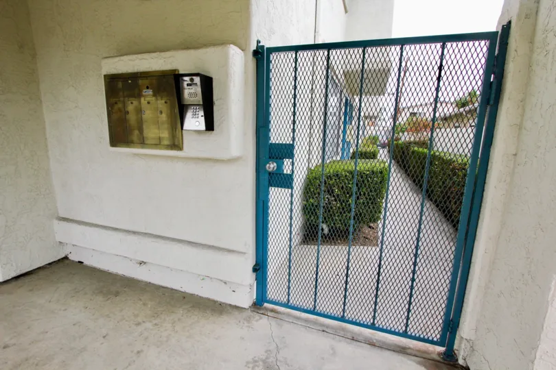 Gated apartment entrance at location Casa Diego II North Park California