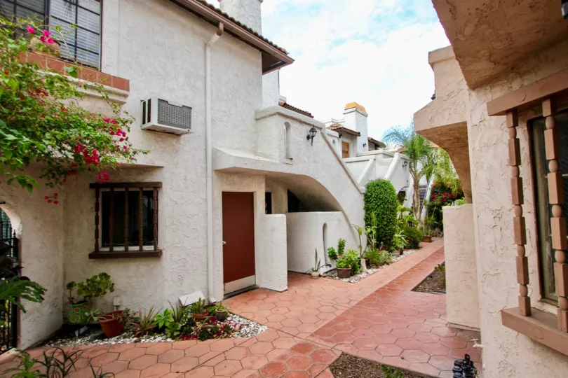 Charming Mediterranean front gates, clay tiles and curb appeal are common in Casa Frontera, a development in North Park, CA