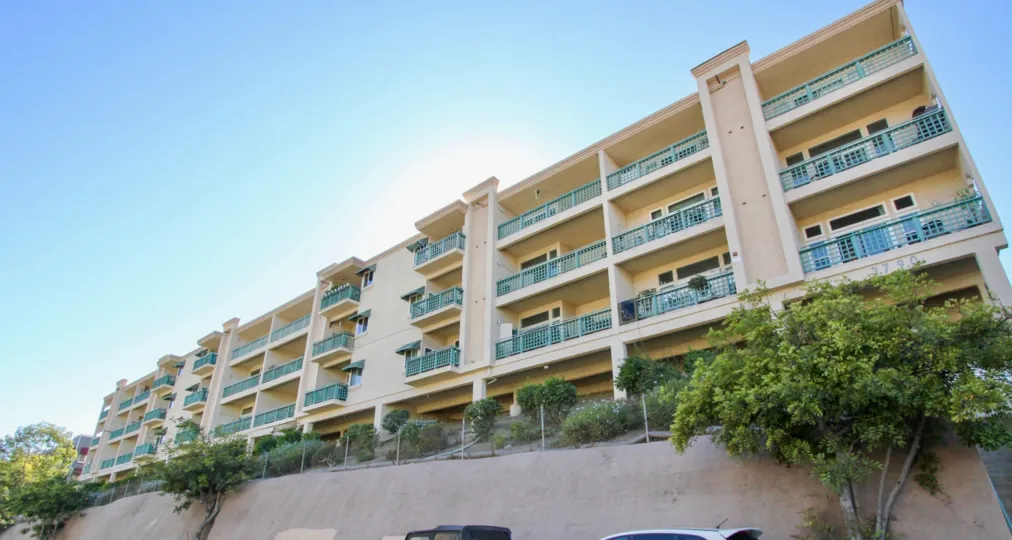 Frontal elevation of Apartment with railing in Coral Ridge.