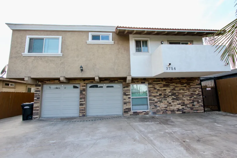 A house with a garage in the Estelle neighborhood of North Park, CA