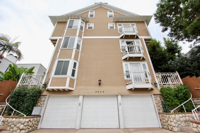 Florida Canyon Villas Multi-Story Beige Building with Three Garages North Park California