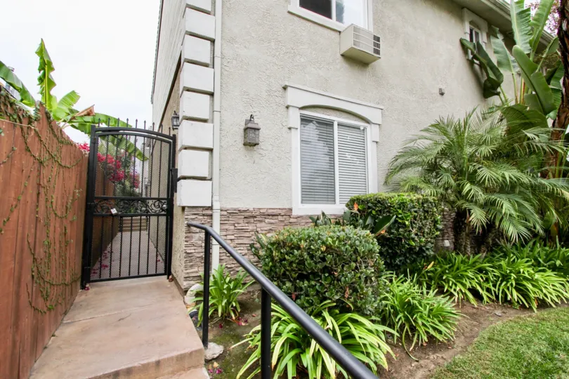 Ornamental plants in front of a house in the Florida Gardens neighborhood of North Park, CA.